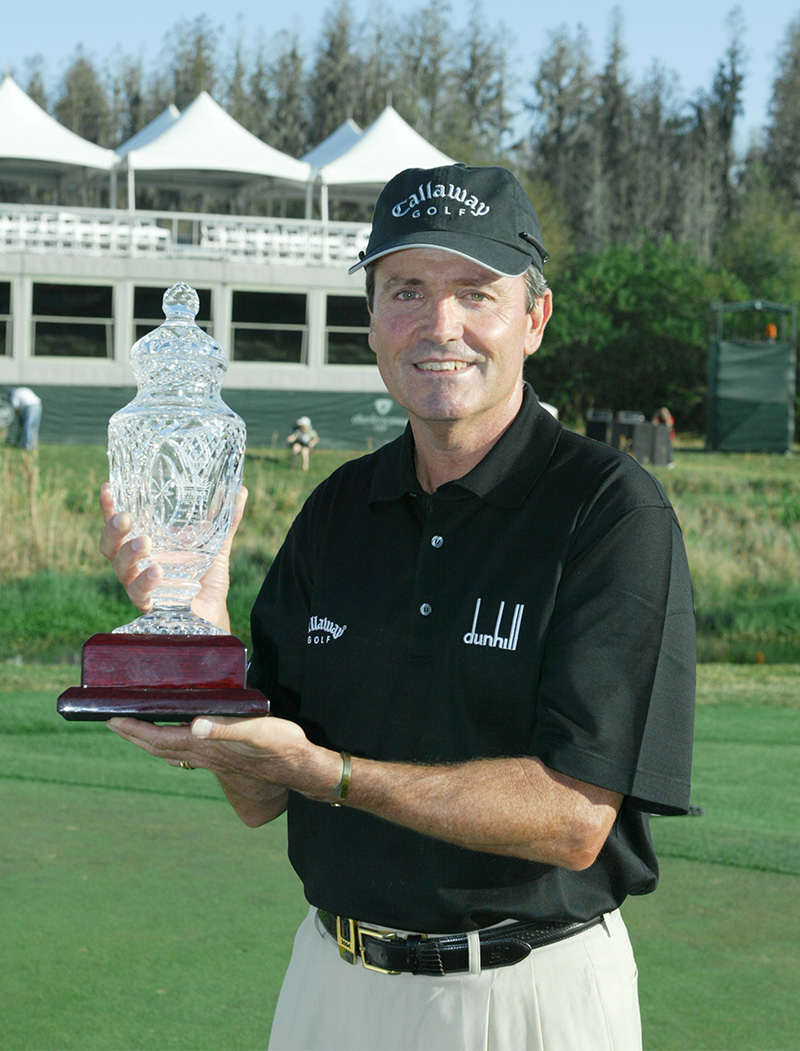 Mark McNulty Professional Golfer with crystal trophy